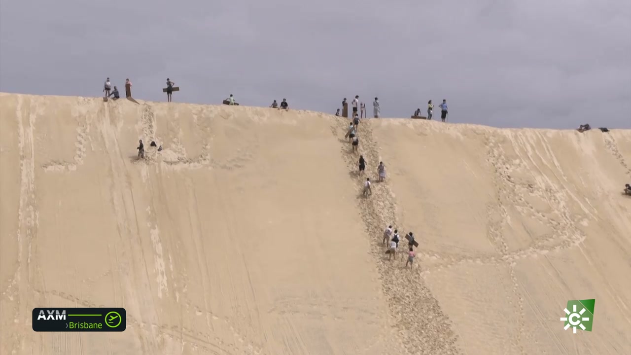 Surfing en las dunas de arena
